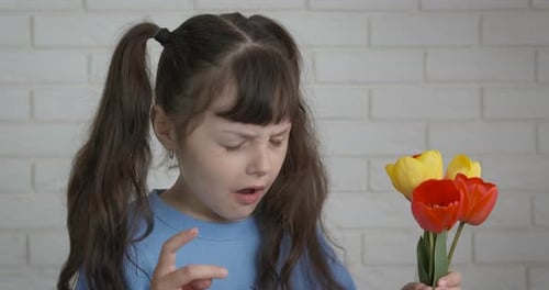 Little Girl Allergic to Pretty Springtime Tulips