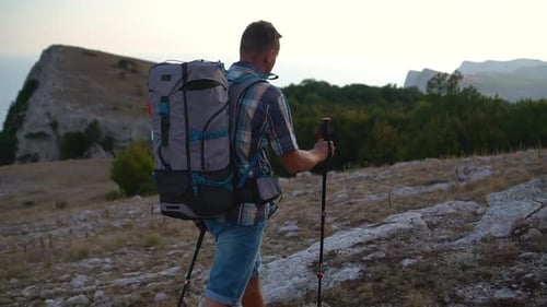 Man Hiking in Mountain Hike Travel Rocky Meadow at Evening Spbd