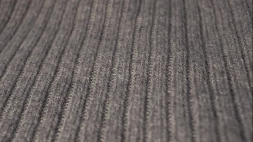 Close Up of Knitted Gray Fabric Texture