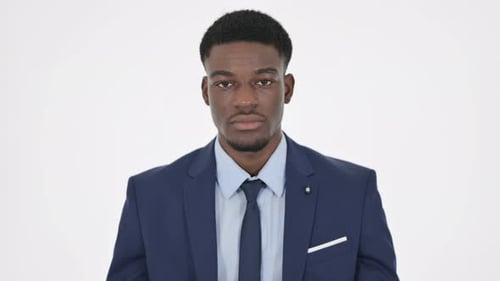 Young Adult in Suit Against White Background