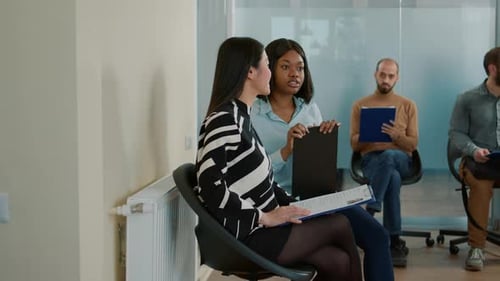 Job Applicants Wait in an Office Waiting Room
