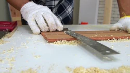 Carpenter Working on Wood Craft at Workshop