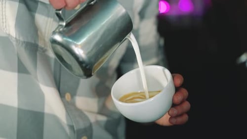 Barista Pouring Milk Making Latte Art