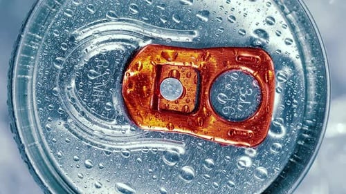 Aluminum Soda Tin Can Lid Cover of Soft Drink on Ice Goes Around the Circle.