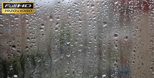 Raindrops on Glass Window Pane Obscuring View