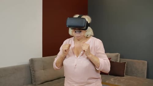 Senior Woman Using Virtual Reality Headset at Home