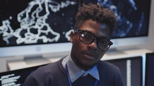 Young Adult Working in Technology Workplace