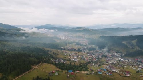 Aerial View of Village in Mountainous Forest
