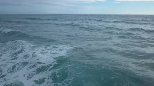 Aerial Sea Waves Calming and Splashing, Camera Locked Above Pure Water Surface