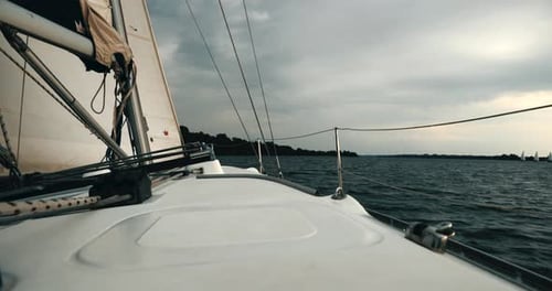 Sailboat Sailing on Ocean on Overcast Day