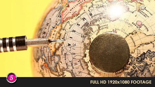 Dart Pointing at Globe Geographic Travel