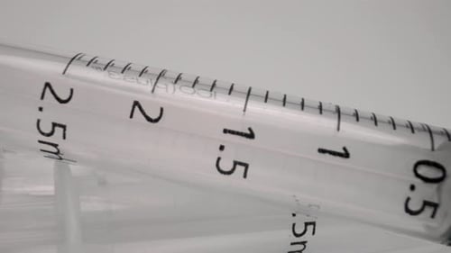 A Row of Medical Syringes