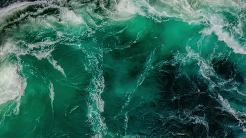 Waves of Water of the River and the Sea Meet Each Other During High Tide and Low Tide.