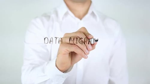 Data Migration Written on Clear Surface