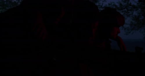 Group of Solider Using Flares to Signal Their Position During Military Action in Dense Forest