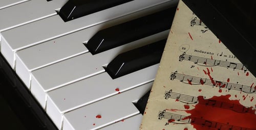 Piano Keyboard Covered with Blood Splatter