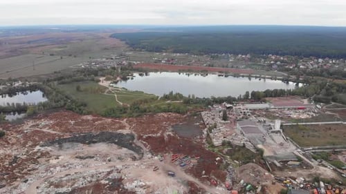 Aerial view of construction waste garbage dump. Problem of environmental pollution