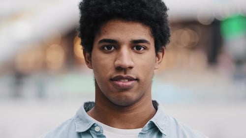 Close Up Male Business Portrait Indoor 20s African Dominican Biracial Man Guy Male Smiling Looking