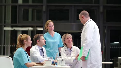 Medical Team Meeting and Shaking Hands in Hospital