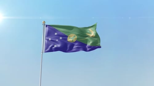 Realistic Christmas Island Flag Waving Seamlessly in Blue Sky