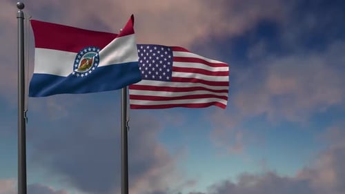 Missouri and US Flags Waving in Cloudy Sky