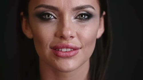 Close Up of Woman's Face with Dramatic Makeup