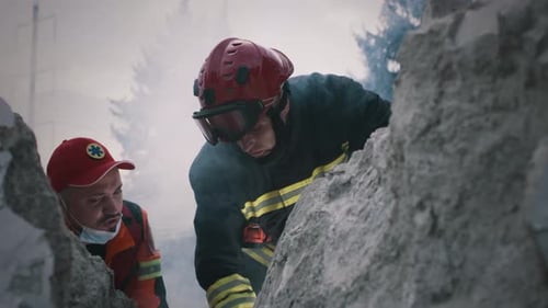 Rescuers Help After Building Collapse