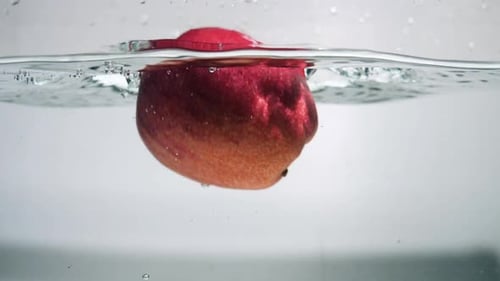 Apple Dropping Water