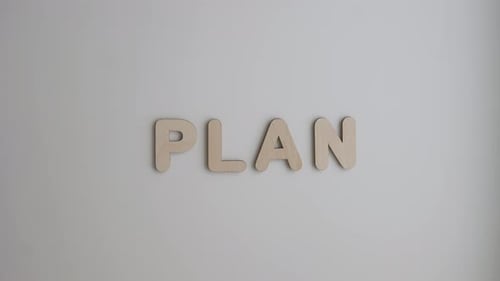 Plan Spelled Out Using Wooden Letters