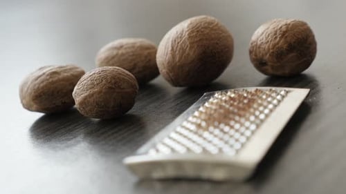 Nutmeg Seeds and Microplane Grater Close Up