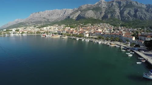 Aerial view of a seaport by the mountains