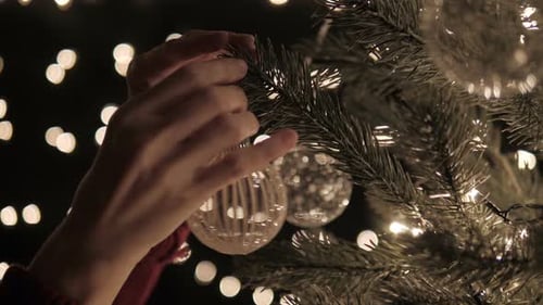 Decorating Christmas Tree with Ornaments