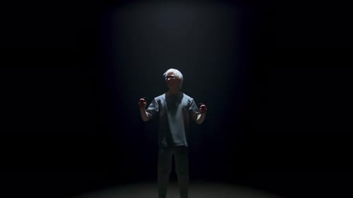 Man Using Controllers in Dark Virtual Reality Setting