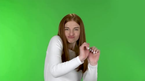 Expressive Woman Gesturing Negatively on Green Screen