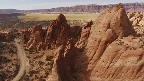 Slowly moving footage over red rock spires