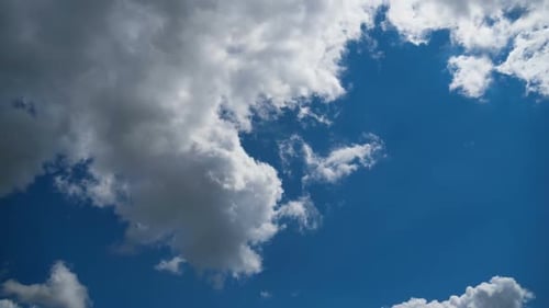 Clouds Drifting Across a Blue Sky