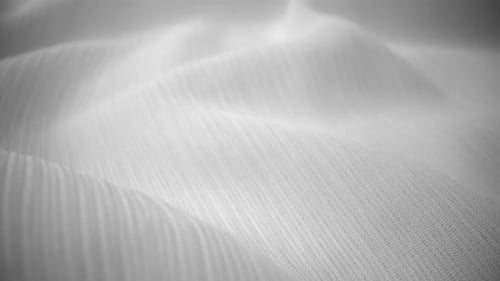 Muñeca de tela de red brillante, textura fluida, fotografiada en primer plano, vista macro