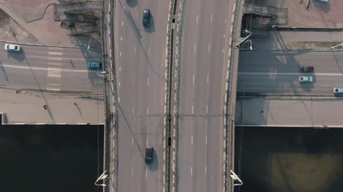Aerial Top Down View of Traffic of Cars on the Bridge in a Populated City