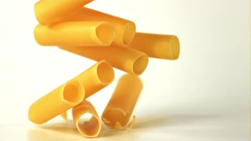Falling Cylindrical Pasta Landing in a Pile