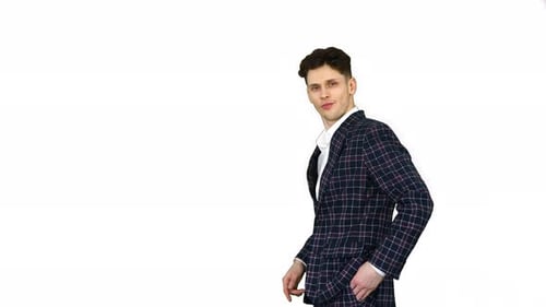 Young Man in Plaid Suit Posing on White