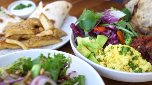 Colorful Healthy Food Spread Displayed on Wooden Table