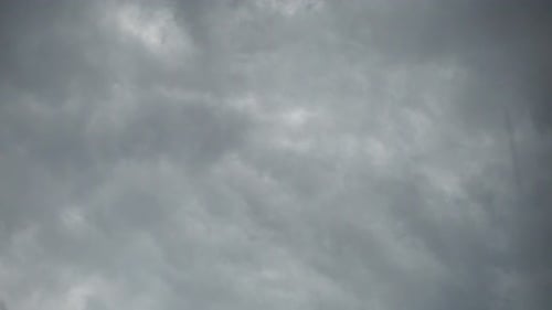 Real Time Flying Amazing Grey Rain Clouds and Rain Drops Falling Down..