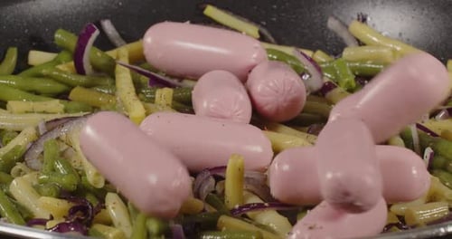 Cooking In A Pan. Asparagus With Sausages. Cooking