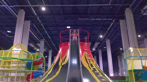 Girl Goes Down On Slide