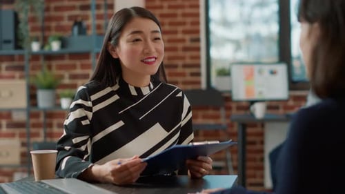 Business Meeting With Women in Modern Office