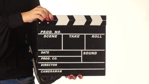 Woman Uses Movie Production Clapper Board, on White