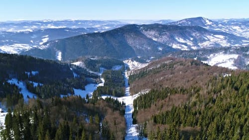 Aerial - Ski Lift at Ski Resort in Sunny Carpatian Mountains