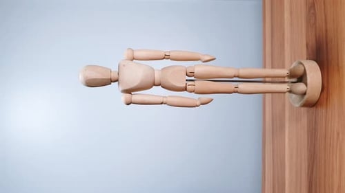 Wooden Mannequin Still Life on Light Background