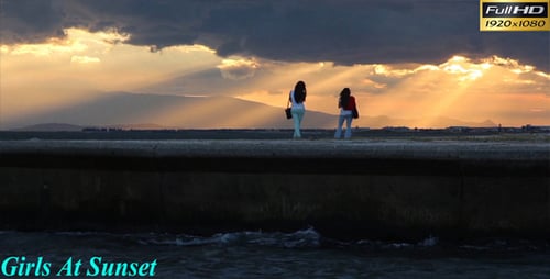 Girls at Sunset on Seaside Promenade Wall