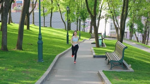 Female Jogger Training in Green Park